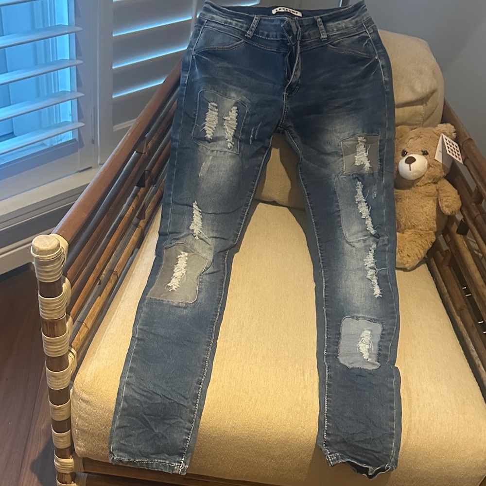 BNWOT Distressed Blue Jeans with stretch.
